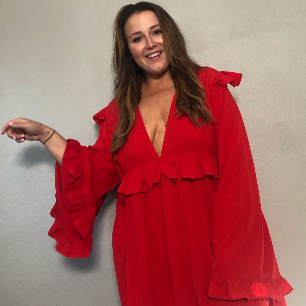 Red plunge curve and plus dress